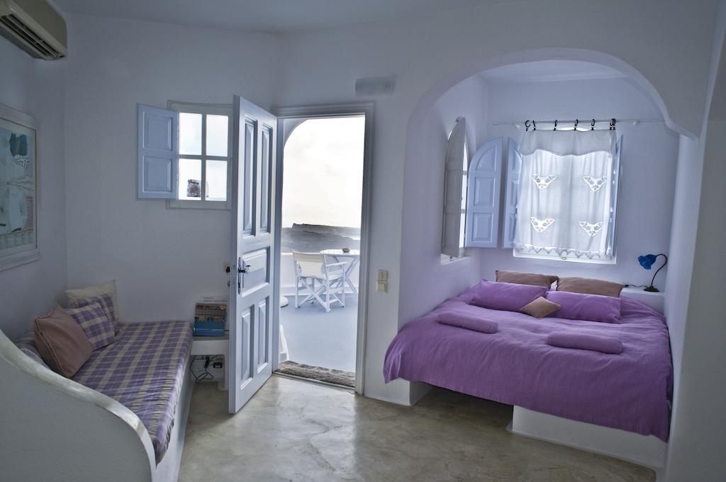 Altana Heritage Suites Imerovigli  Bilik gambar