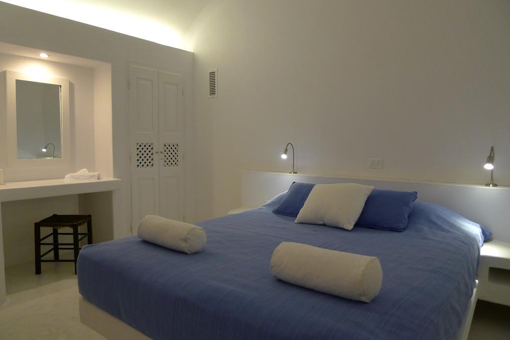 Altana Heritage Suites Imerovigli  Bilik gambar